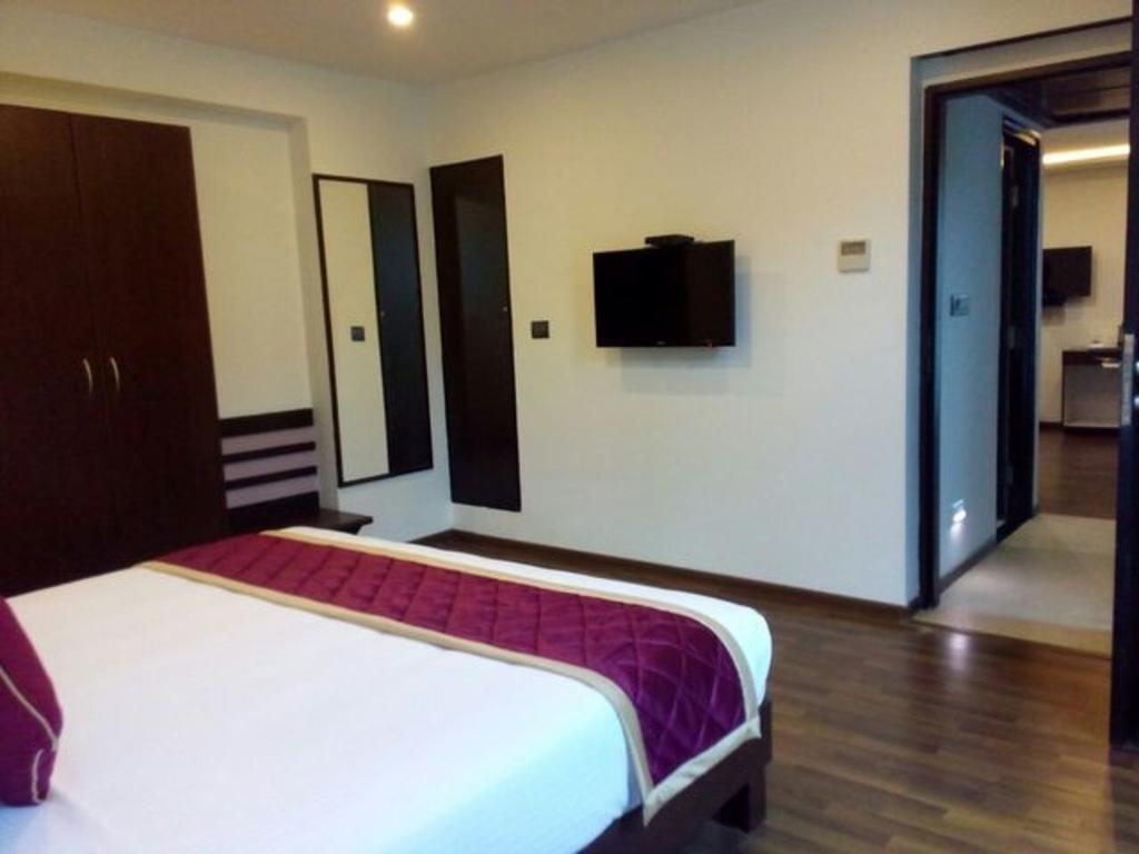 Akshaya Aura Otel Bangalore Oda fotoğraf
